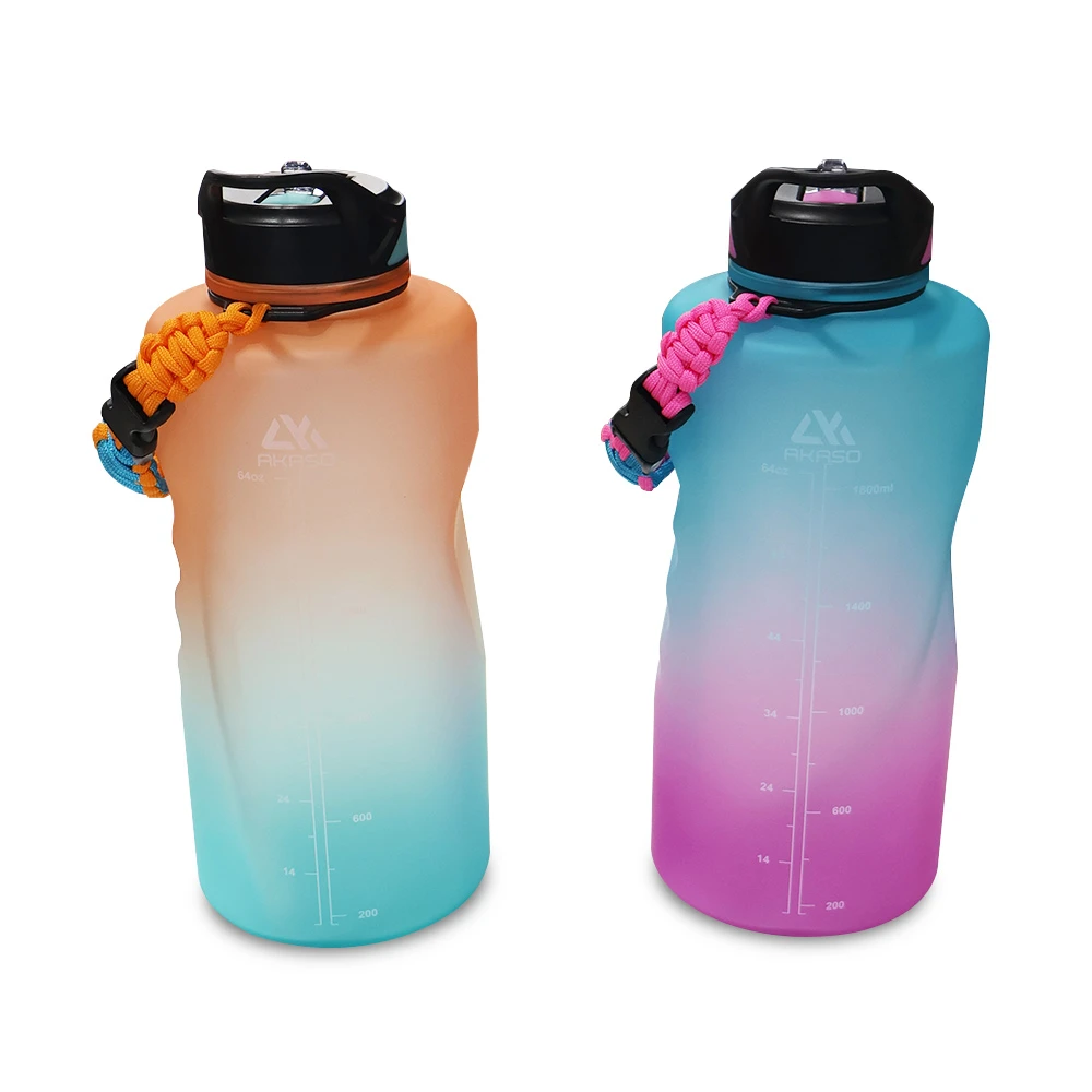 Two AKASO 64oz gradient bottles, orange-blue and blue-pink, with paracord handles