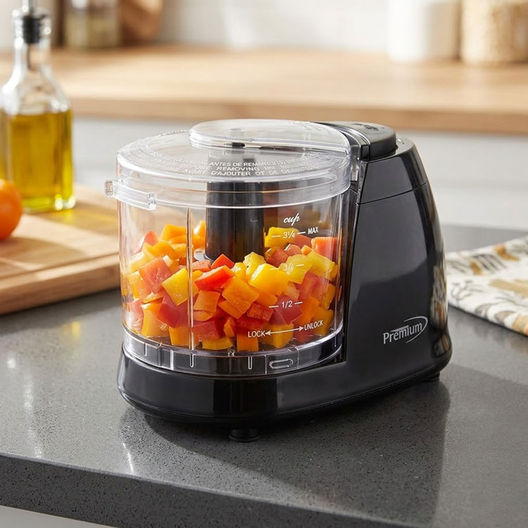 Space-saving 1.5 cup mini chopper on kitchen counter.