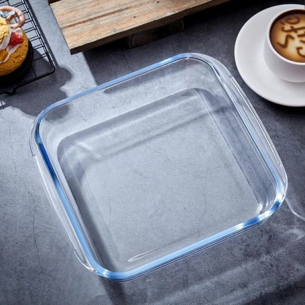  Empty square glass baking dish on table.