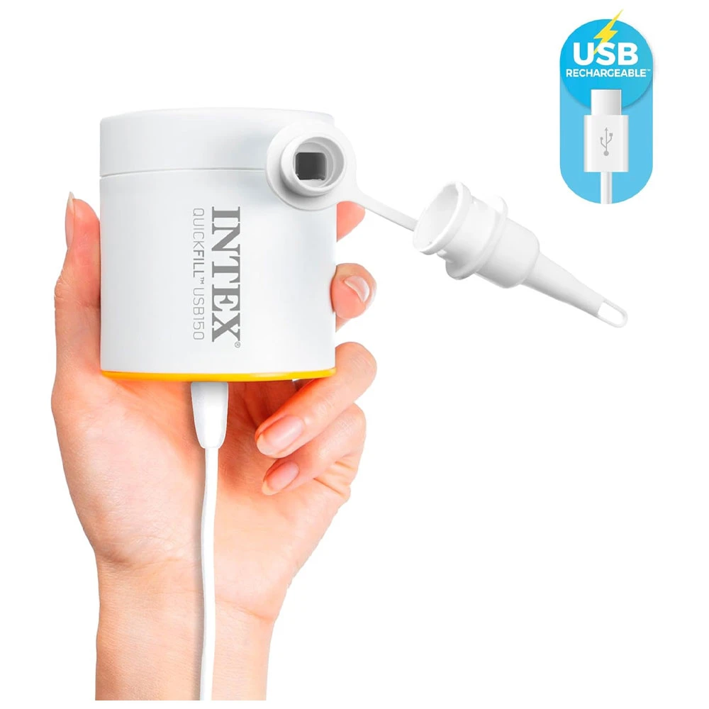A hand is holding a compact white Intex Quick-Fill USB150 air pump