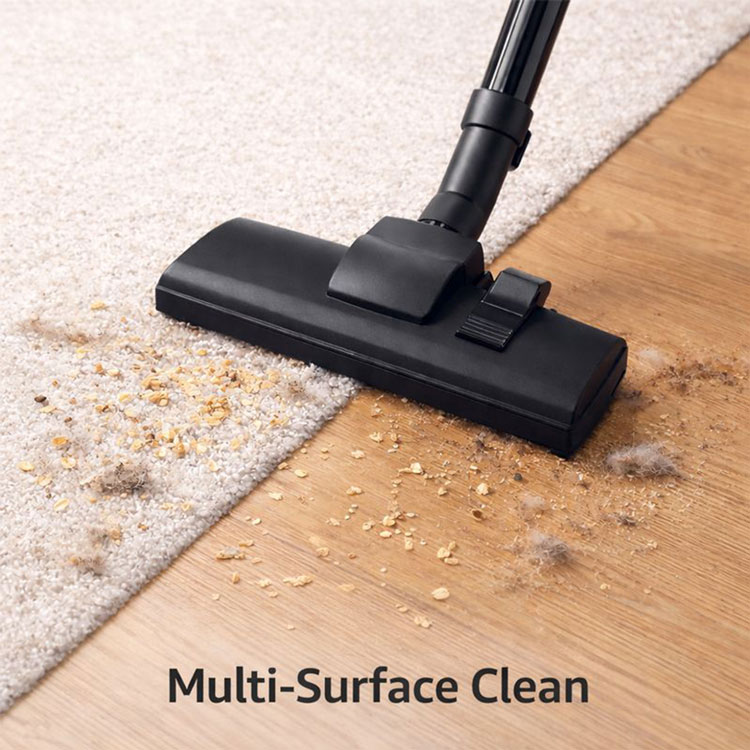 Cyclonic vacuum cleaner suction on carpet and wood.