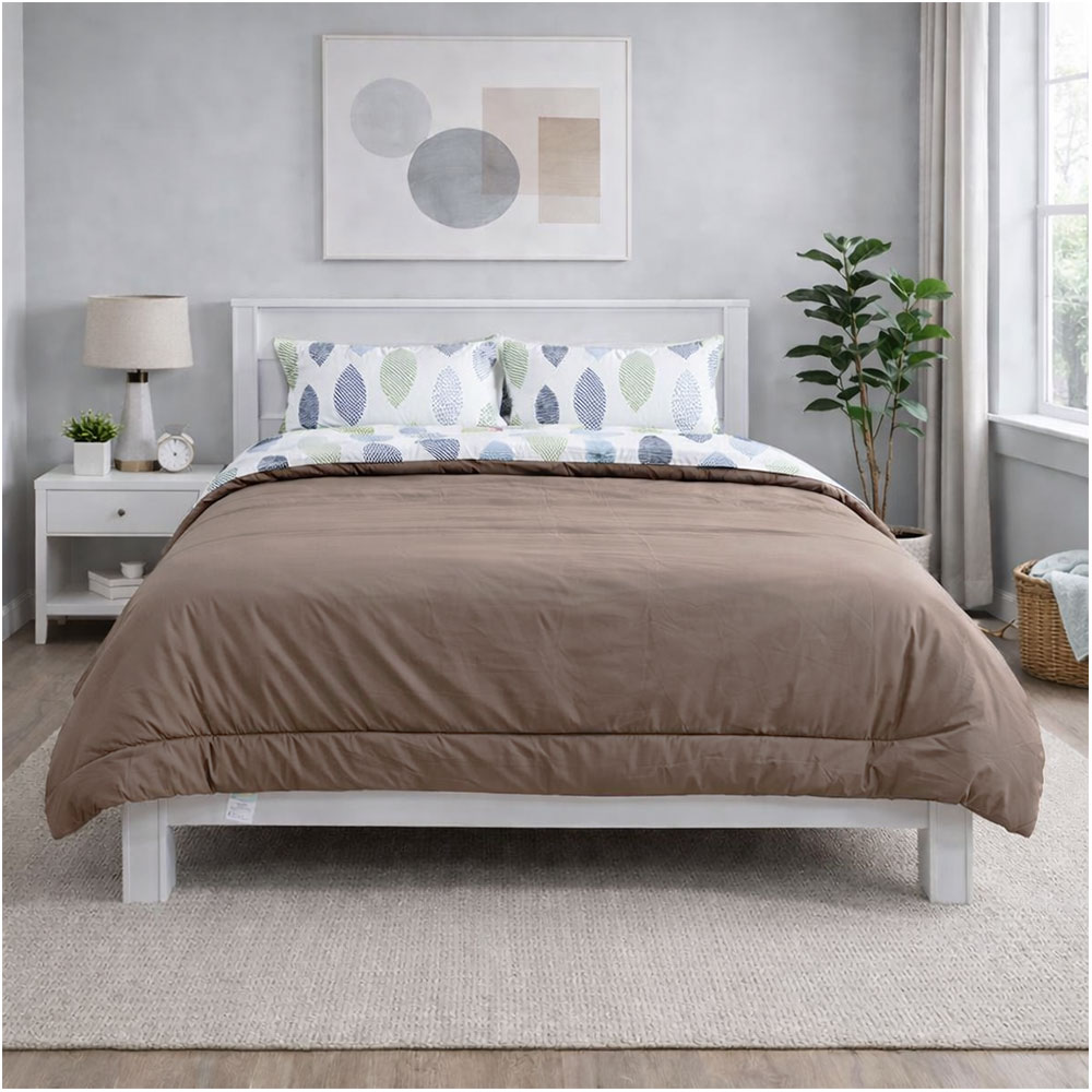 Reversible dark brown and oval print comforter set.