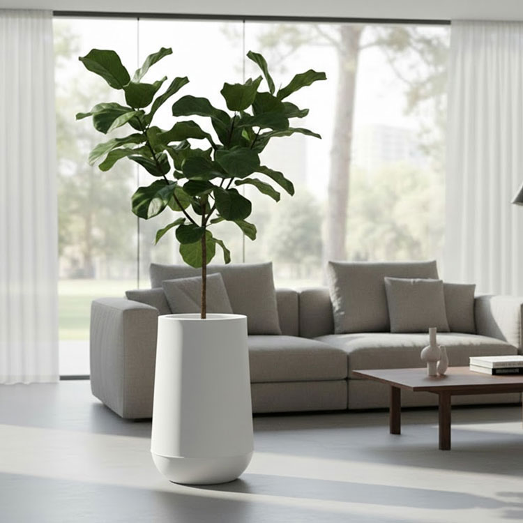 White tapered Allure plant pot by grey sofa