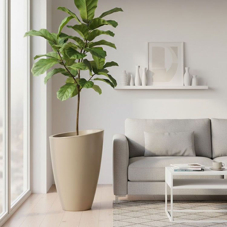 Minimalist living room with tall beige Eden planter.