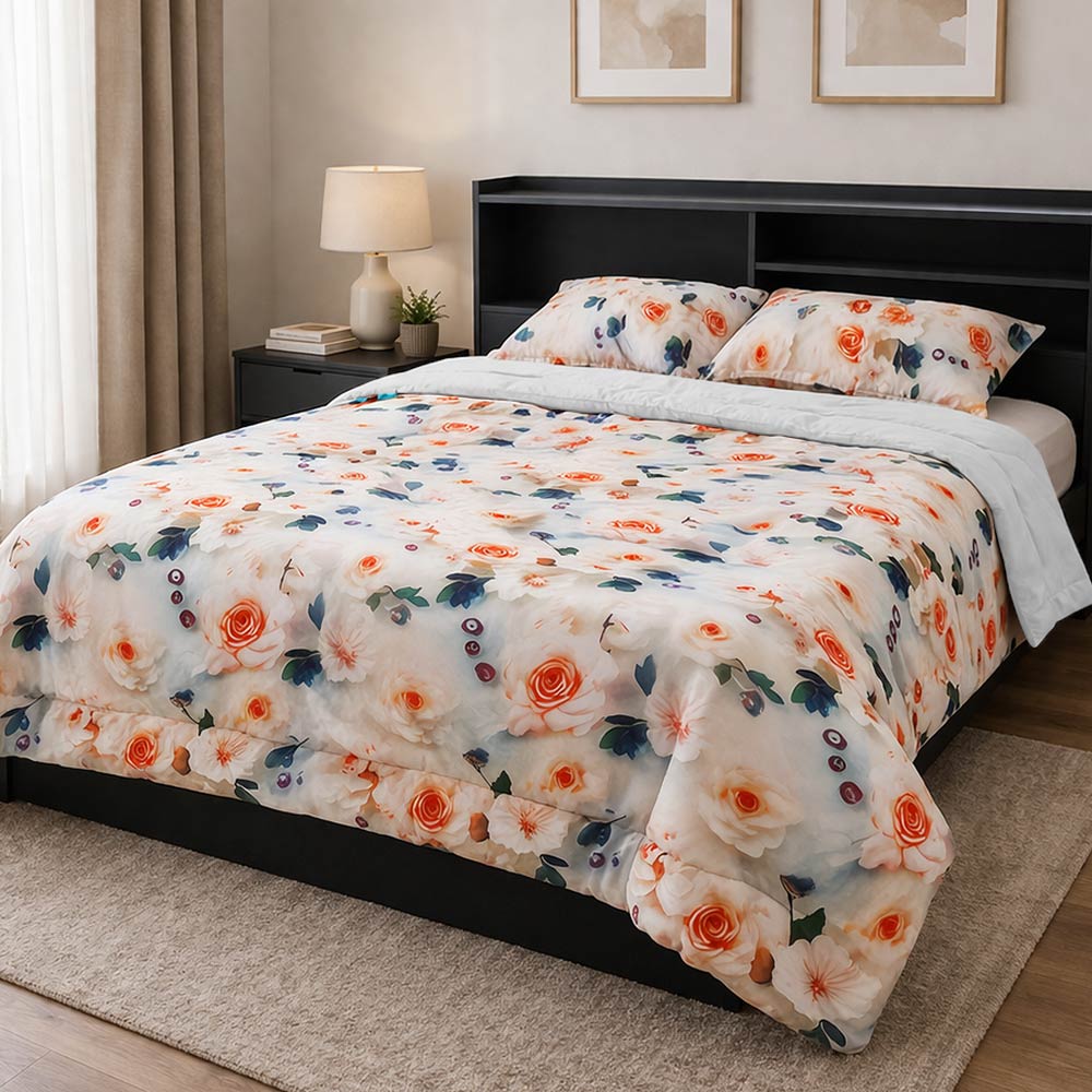White rose floral reversible comforter set on bed.
