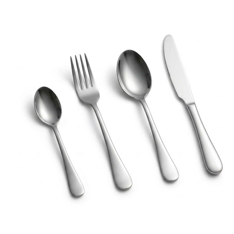 Silver 24 piece cutlery set on white background