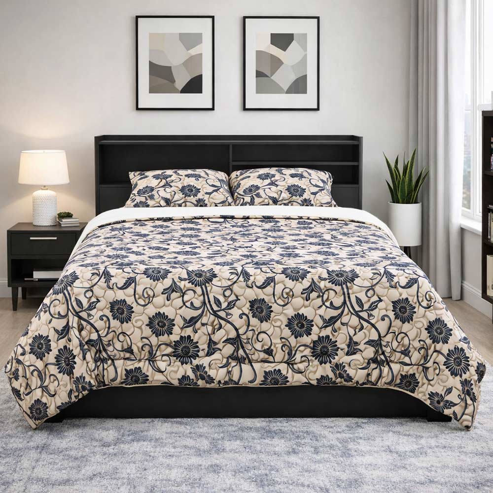 Christy’s black flower floral comforter with matching shams.