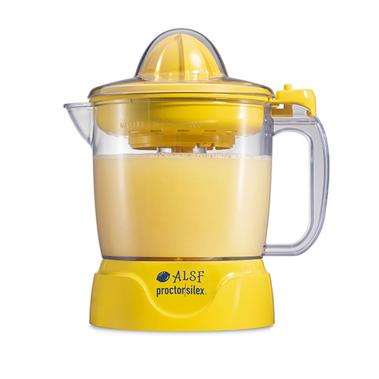 Proctor Silex yellow citrus juicer with fresh juice