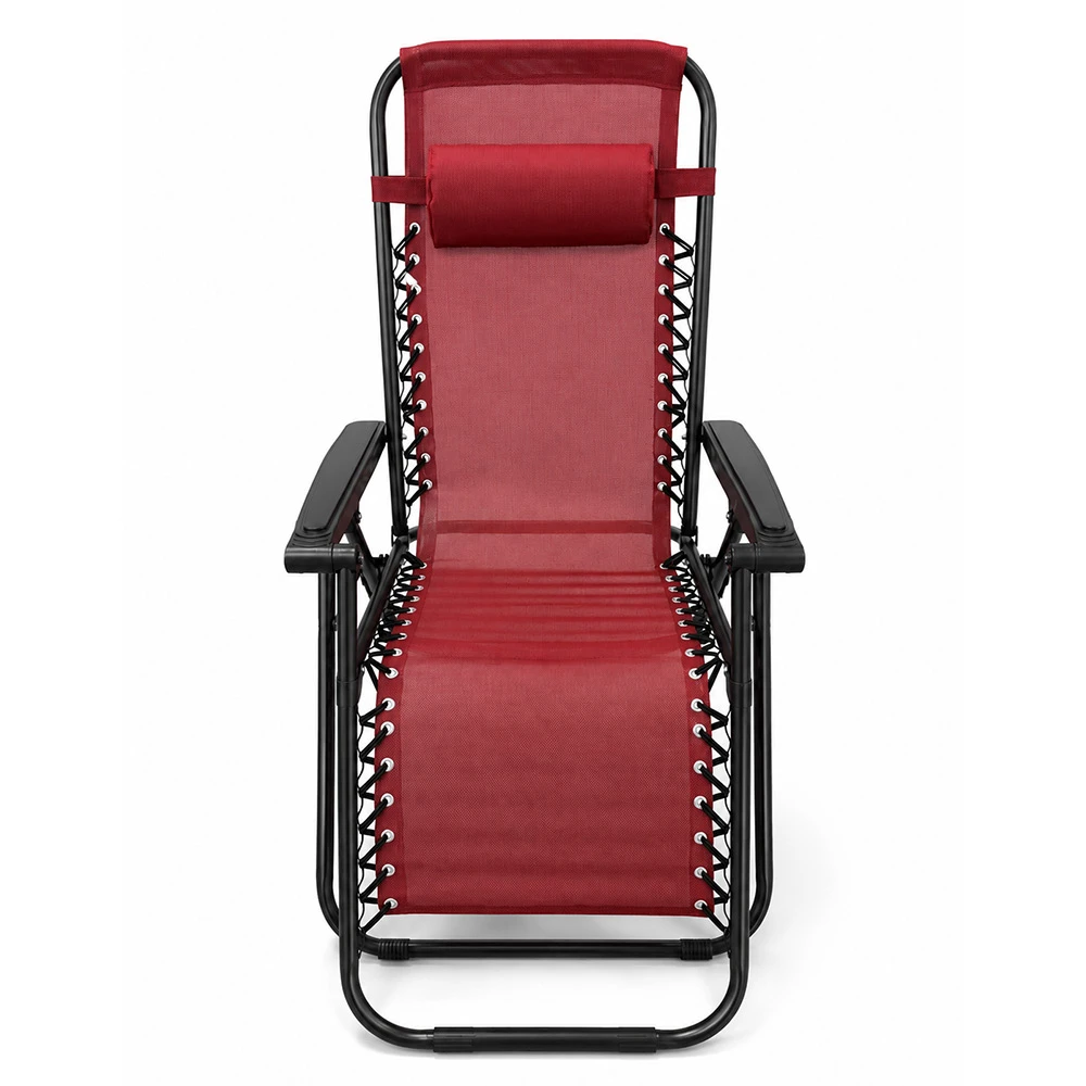 Red folding beach chair with black metal frame and head pillow